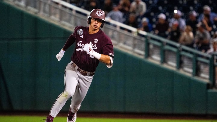 Jun 19, 2024; Omaha, NE, USA; Texas A&M Aggies shortstop Ali Camarillo (2) rounds second after hitting a triple against the Florida Gators during the ninth inning at Charles Schwab Field Omaha. Mandatory Credit: Dylan Widger-USA TODAY Sports