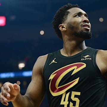 Dec 29, 2023; Cleveland, Ohio, USA; Cleveland Cavaliers guard Donovan Mitchell (45) reacts after a play during the first half against the Milwaukee Bucks at Rocket Mortgage FieldHouse. Mandatory Credit: Ken Blaze-Imagn Images