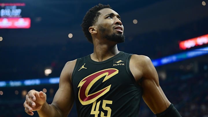 Dec 29, 2023; Cleveland, Ohio, USA; Cleveland Cavaliers guard Donovan Mitchell (45) reacts after a play during the first half against the Milwaukee Bucks at Rocket Mortgage FieldHouse. Mandatory Credit: Ken Blaze-Imagn Images