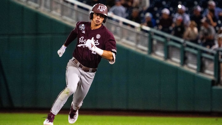 Jun 19, 2024; Omaha, NE, USA; Texas A&M Aggies shortstop Ali Camarillo (2) rounds second after hitting a triple against the Florida Gators during the ninth inning at Charles Schwab Field Omaha. 