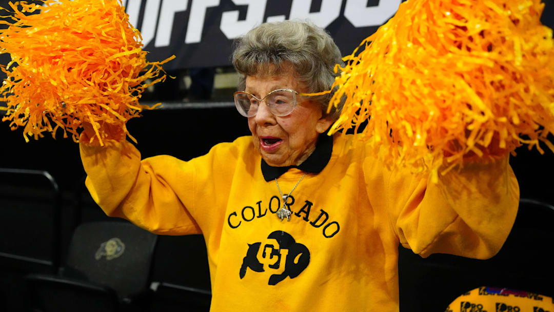 Feb 22, 2025; Boulder, Colorado, USA; Colorado Buffaloes fan Peggy Coppom cheers in the first half against the Baylor Bears at the CU Events Center. Mandatory Credit: Ron Chenoy-Imagn Images Feb 22, 2025; Boulder, Colorado, USA; Colorado Buffaloes fan Peggy Coppom cheers in the first half against the Baylor Bears at the CU Events Center. Mandatory Credit: Ron Chenoy-Imagn Images