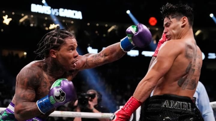 Gervonta "Tank" Davis delivers a knockout blow to Ryan Garcia during their highly anticipated bout