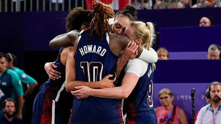 Team USA celebrates winning the bronze medal in women's 3x3 basketball on Monday at Esplanade Des Invalides.