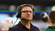 Sep 7, 2024; Miami Gardens, Florida, USA; Miami Hurricanes offensive coordinator Shannon Dawson looks on from the sideline against the Florida A&M Rattlers during the first quarter at Hard Rock Stadium. Mandatory Credit: Sam Navarro-Imagn Images