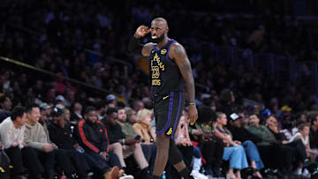Nov 18, 2025; Los Angeles, California, USA; Los Angeles Lakers forward LeBron James (23) reacts against the Utah Jazz in the fourth quarter at Crypto.com Arena. Mandatory Credit: Kirby Lee-Imagn Images