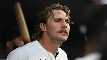 Oct 1, 2024; Baltimore, Maryland, USA; Baltimore Orioles shortstop Gunnar Henderson (2) looks out from the dugout against the Kansas City Royals in game one of the Wild Card round for the 2024 MLB Playoffs at Oriole Park at Camden Yards.