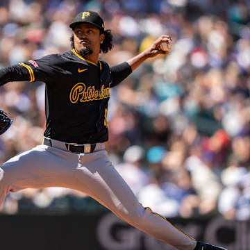 Jul 6, 2025; Seattle, Washington, USA; Pittsburgh Pirates reliever Genesis Cabrera (92) delivers a pitch during the eighth inning against the Seattle Mariners at T-Mobile Park. Mandatory Credit: Stephen Brashear-Imagn Images