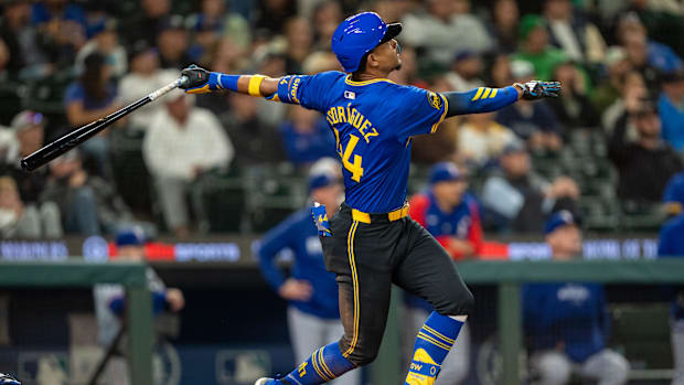 Julio Rodriguez's three-run home run in the eighth lifted the Seattle Mariners over the Texas Rangers 5-4 on Friday.