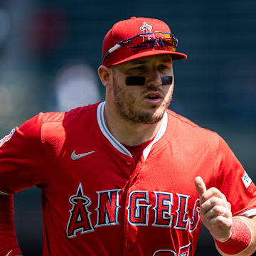 Apr 30, 2025; Seattle, Washington, USA;  Los Angeles Angels right fielder Mike Trout (27) jogs off the field before a game against the Seattle Mariners at T-Mobile Park. Mandatory Credit: Stephen Brashear-Imagn Images