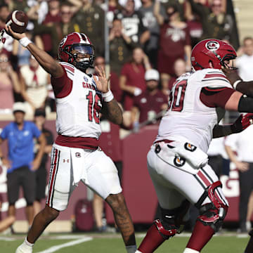 Nov 15, 2025; College Station, Texas, USA; South Carolina Gamecocks quarterback Lanorris Sellers (16) completes a fourth down pass for a first down during the fourth quarter against the Texas A&M Aggies at Kyle Field. Mandatory Credit: Troy Taormina-Imagn Images
