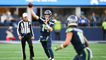 Nov 9, 2025; Seattle, Washington, USA; Seattle Seahawks quarterback Sam Darnold (14) throws a pass during the fourth quarter against the Arizona Cardinals at Lumen Field. Mandatory Credit: Steven Bisig-Imagn Images