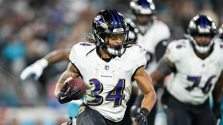 Baltimore Ravens running back Keaton Mitchell (34) runs the ball against the Jacksonville Jaguars in the fourth quarter at EverBank Stadium. Baltimore Ravens running back Keaton Mitchell (34) runs the ball against the Jacksonville Jaguars in the fourth quarter at EverBank Stadium.