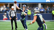 Nov 9, 2025; Seattle, Washington, USA; Seattle Seahawks quarterback Sam Darnold (14) throws a pass during the fourth quarter against the Arizona Cardinals at Lumen Field. Mandatory Credit: Steven Bisig-Imagn Images