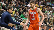 Jan 2, 2025; Eugene, Oregon, USA; Illinois Fighting Illini center Tomislav Ivisic (13) goes to the bench during the second half against the Oregon Ducks at Matthew Knight Arena. Mandatory Credit: Craig Strobeck-Imagn Images