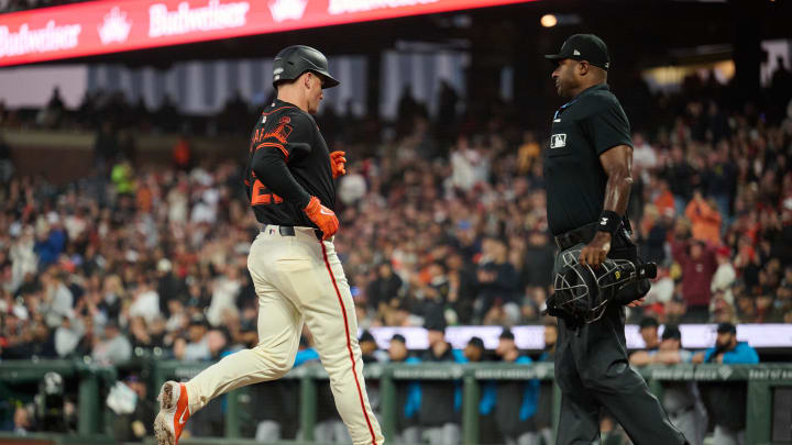 Aug 31, 2024; San Francisco, California, USA; San Francisco Giants infielder Matt Chapman (26) scores a run on an RBI single by infielder Tyler Fitzgerald (49) (not pictured) against the Miami Marlins during the sixth inning at Oracle Park.