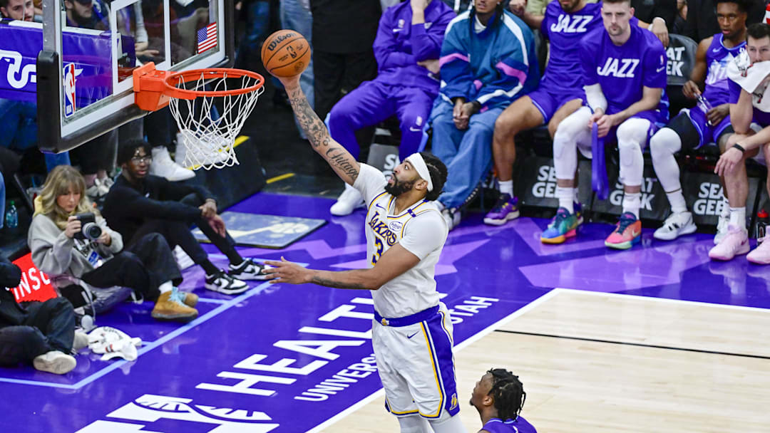 Dec 1, 2024; Salt Lake City, Utah, USA; Los Angeles Lakers forward/center Anthony Davis (3) shoots over Utah Jazz guard Isaiah Collier (13) during the second half at the Delta Center. Mandatory Credit: Christopher Creveling-Imagn Images