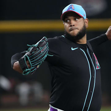 Jul 4, 2025; Phoenix, Arizona, USA; Arizona Diamondbacks pitcher Eduardo Rodriguez (57) pitches against the Kansas City Royals during the first inning at Chase Field. Mandatory Credit: Joe Camporeale-Imagn Images