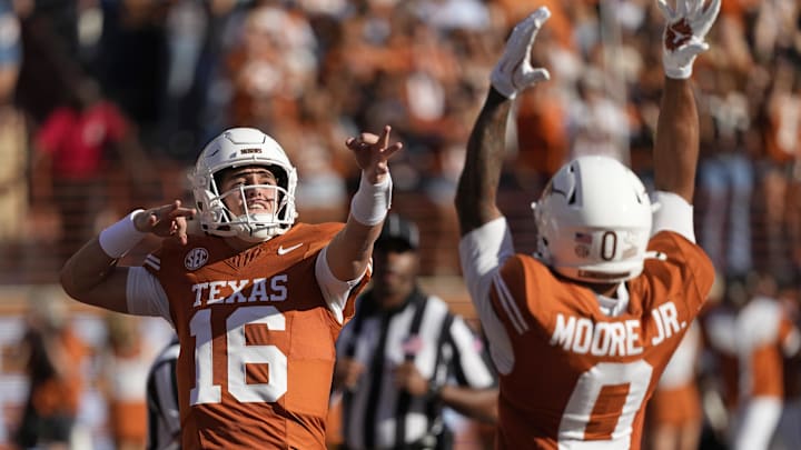 Manning (#16) had a lot to celebrate about in Texas‘ big win over Arkansas. Manning (#16) had a lot to celebrate about in Texas‘ big win over Arkansas.