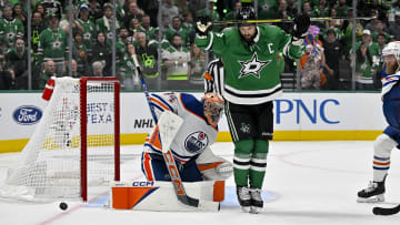 May 23, 2024; Dallas, Texas, USA; Dallas Stars left wing Jamie Benn (14) tries to redirect the puck past Edmonton Oilers goaltender Stuart Skinner (74) during the overtime period in game one of the Western Conference Final of the 2024 Stanley Cup Playoffs at American Airlines Center. Mandatory Credit: Jerome Miron-USA TODAY Sports