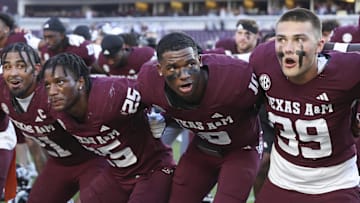 Sep 27, 2025; College Station, Texas, USA; Texas A&M Aggies quarterback Marcel Reed (10) celebrates with teammates after the game against the Auburn Tigers at Kyle Field. Mandatory Credit: Troy Taormina-Imagn Images