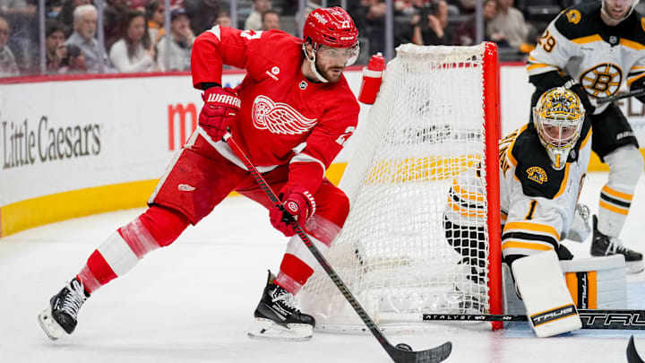 Detroit Red Wings' forward Michael Rasmussen makes a move towards the net against the Boston Bruins.