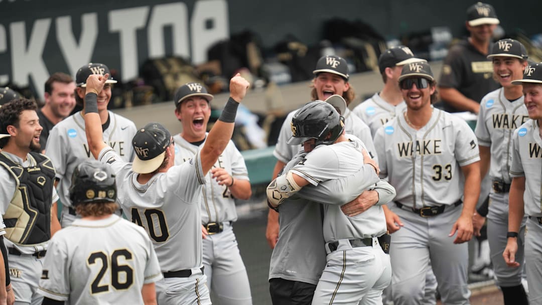 The Wake Forest baseball team celebrates after Wake Forest infielder Marek Houston (7) hits a home run during a NCAA regional baseball game between the Cincinnati Bearcats and Wake Forest Demon Deacons at Lindsey Nelson Stadium in Knoxville, Tenn., on June 1, 2025.