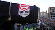 Detailed view of a ESPN college football emblem on a end zone broadcast camera