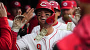 Reds Matt McLain (9) scores a homerun during their game against the Texas Rangers on Monday March 31, 2025 at Great American Ball Park.
