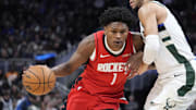 Nov 9, 2025; Milwaukee, Wisconsin, USA; Houston Rockets guard Amen Thompson (1) drives to the basket against Milwaukee Bucks in the first half at Fiserv Forum. Mandatory Credit: Michael McLoone-Imagn Images