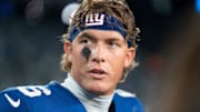 New York Giants quarterback Jaxson Dart (6) talks with players after winning the Thursday Night Football game between the New York Giants and the Philadelphia Eagles at MetLife Stadium in East Rutherford on Oct. 9, 2025.