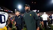Michigan coach Sherrone Moore leaves the field after a college football game between the University of Oklahoma Sooners (OU) and the University of Michigan Wolverines at Gaylord Family Ð Oklahoma Memorial Stadium in Norman, Okla., Saturday, Sept. 6, 2025. Oklahoma won 24-13.