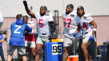 Jul 26, 2024; East Rutherford, NJ, USA; New York Giants linebacker Kayvon Thibodeaux (5) does a drill alongside New York Giants defensive tackle Dexter Lawrence (97) and New York Giants cornerback Nick McCloud (44) during training camp at Quest Diagnostics Training Center. Mandatory Credit: Lucas Boland-USA TODAY Sports