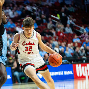 Cedar Falls' William Gerdes drives to the basket against Debuque Senior on Monday, March 10, 2025, at Wells Fargo Arena in Des Moines.