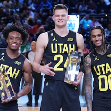 Feb 18, 2023; Salt Lake City, UT, USA; Team Jazz guard Collin Sexton (2), center Walker Kessler (24), and guard Jordan Clarkson (00) celebrate after winning the Skills Competition during the 2023 All Star Saturday Night at Vivint Arena. Mandatory Credit: Kyle Terada-Imagn Images