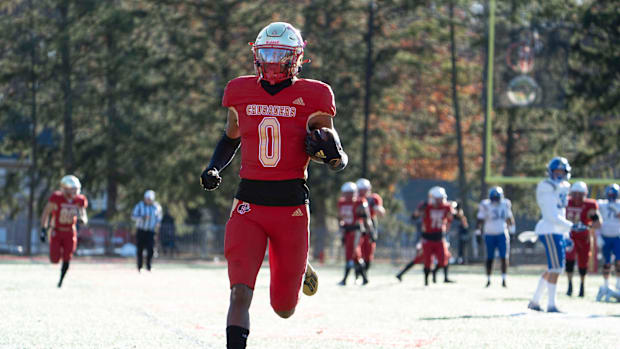 Bergen Catholic's Quincy Porter runs in for a touchdown reception during the 2023 season.