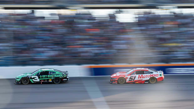Austin Dillon (3) and Justin Haley (51) race down the track during the Iowa Corn 350 on June 16, 2024, at Iowa Speedway.