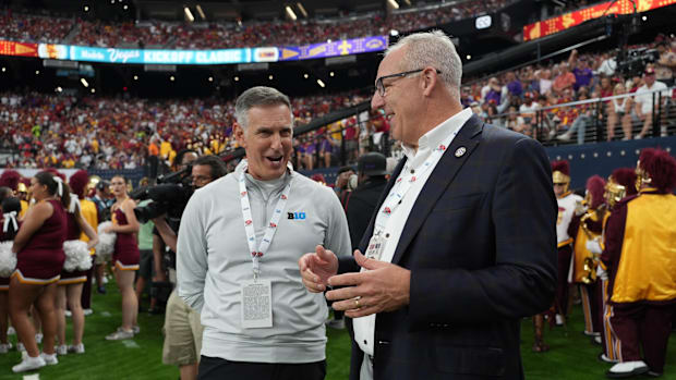 Big 10 commissioner Tony Petitti (left) and SEC commissioner Greg Sankey attend a game between USC and LSU.