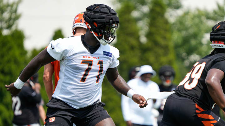 Bengals Amarius Mims defends during the second day of Bengals training camp on Thursday July 25, 2024.