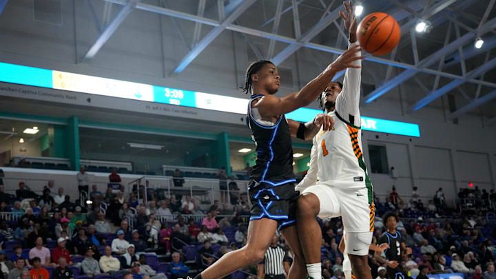 Scenes from the third place game between IMG Academy and Oak Ridge at the City of Palms Classic at Suncoast Credit Union Arena in Fort Myers on Monday, Dec. 23, 2024. IMG Academy won.