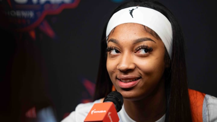 Angel Reese speaks to members of the media during the WNBA All-Star media day at Footprint Center in Phoenix.