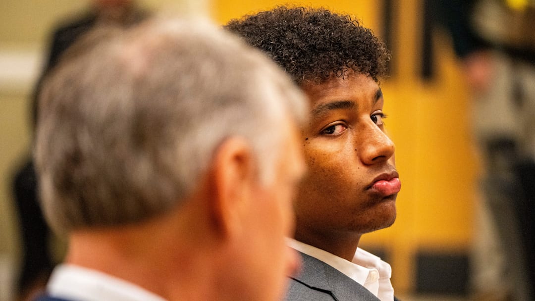 Ole Miss quarterback Trinidad Chambliss glances over toward members of the press during the hearing of his lawsuit against the NCAA at Calhoun County Courthouse in Pittsboro, Miss.