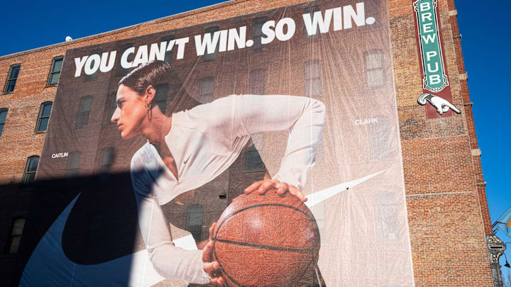 Nike banners featuring Caitlin Clark are installed along the eastern side of Des Moines' Court Avenue Restaurant and Brewing Company on Thursday, Feb. 20, 2025. Nike banners featuring Caitlin Clark are installed along the eastern side of Des Moines' Court Avenue Restaurant and Brewing Company on Thursday, Feb. 20, 2025.