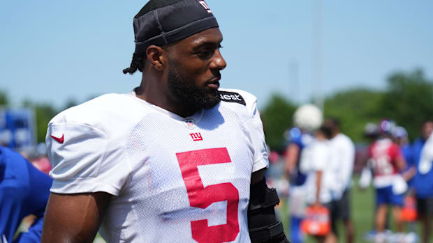Jul 26, 2024; East Rutherford, NJ, USA; New York Giants linebacker Kayvon Thibodeaux (5) walks the sideline during training 