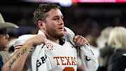 Texas Longhorns quarterback Quinn Ewers (3) looks into the crowd after the 28-14 loss to Ohio State in the College Football Playoff semifinal game in the Cotton Bowl at AT&T Stadium on Friday, Jan. 10, 2024 in Arlington, Texas.