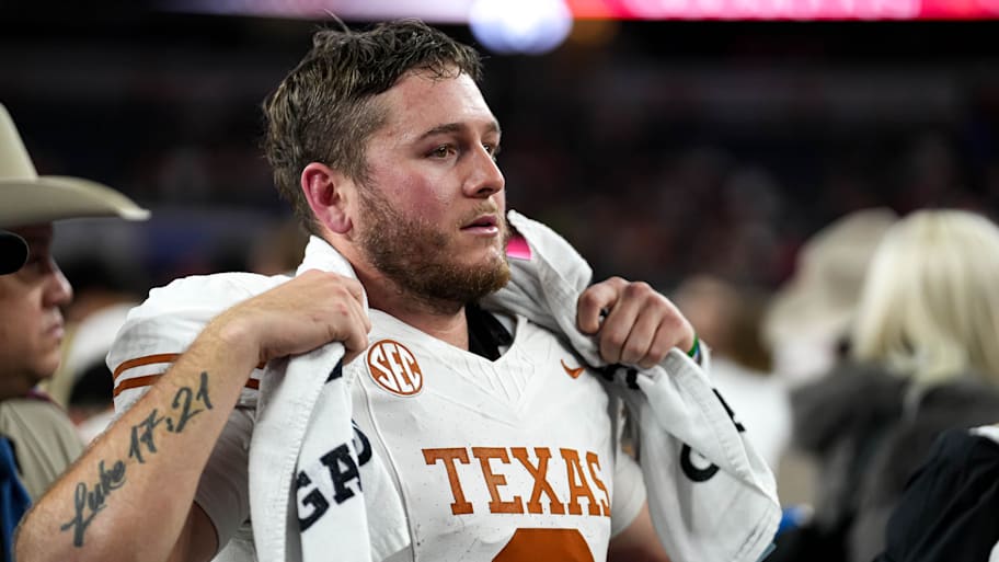 Texas Longhorns quarterback Quinn Ewers (3) looks into the crowd after the 28-14 loss to Ohio State in the College Football Playoff semifinal game in the Cotton Bowl at AT&T. | Aaron E. Martinez/American-Statesman / USA TODAY NETWORK via Imagn Images
