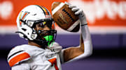 WDM Valley's Jayden McGregory celebrates after scoring a touchdown during a state semifinal game at the UNI-Dome on Friday, November 10, 2023 in Cedar Falls.