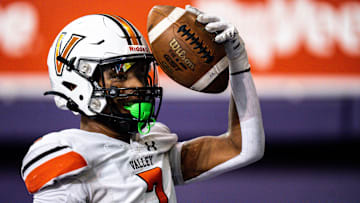 WDM Valley's Jayden McGregory celebrates after scoring a touchdown during a state semifinal game at the UNI-Dome on Friday, November 10, 2023 in Cedar Falls.