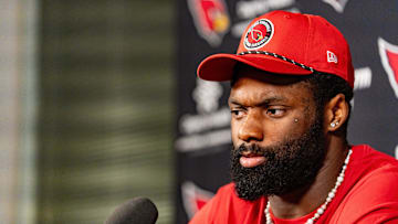Josh Sweat speaks to members of the media at the Arizona Cardinals Training Center in Tempe on March 13, 2025.