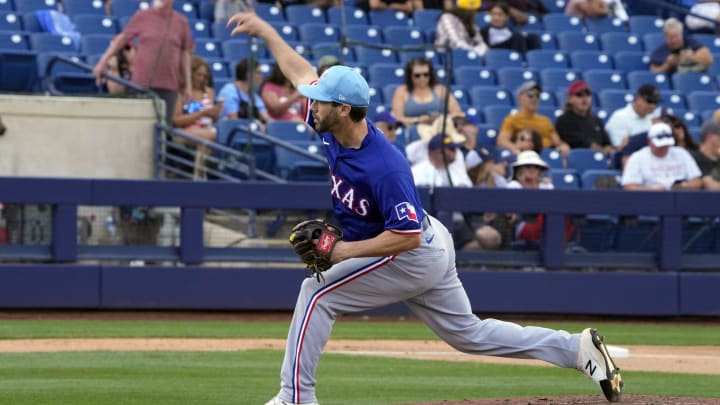 Mar 16, 2024; Phoenix, Arizona, USA; Texas Rangers pitcher Austin Pruitt (49) throws against the Milwaukee Brewers in the fourth inning at American Family Fields of Phoenix. Mandatory Credit: Rick Scuteri-USA TODAY Sports