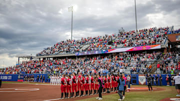 Teams stand for the Nation Anthem before game 3 between Texas Tech and Ole Miss at the Women’s College World Series at Devon Park in Oklahoma City, on Thursday, May 29, 2025.